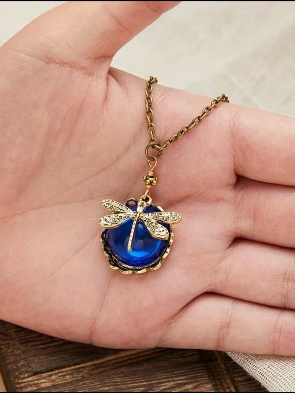 Gold Dragonfly Pendant Necklace with Deep Blue Cabochon On An 18